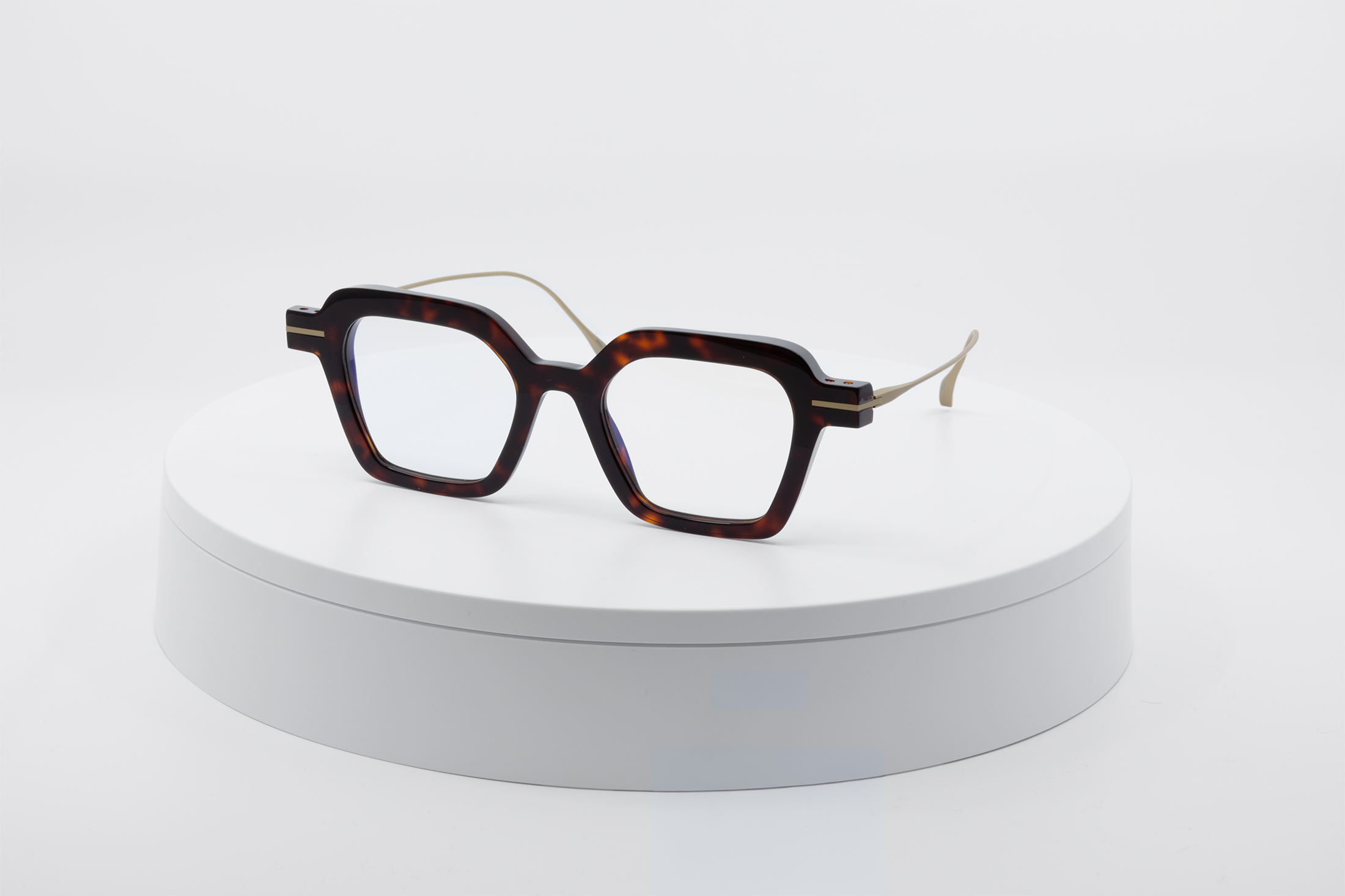 Dec·42 — Dark Tortoise Gold angled